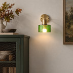Glass drum wall light with round metal backplate