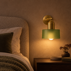 Glass drum wall light with round metal backplate