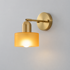 Glass drum wall light with round metal backplate