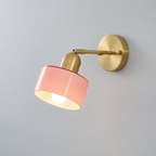 Glass drum wall light with round metal backplate