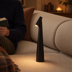 Tapered aluminium table lamp with angled spotlight head