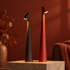 Tapered aluminium table lamp with angled spotlight head