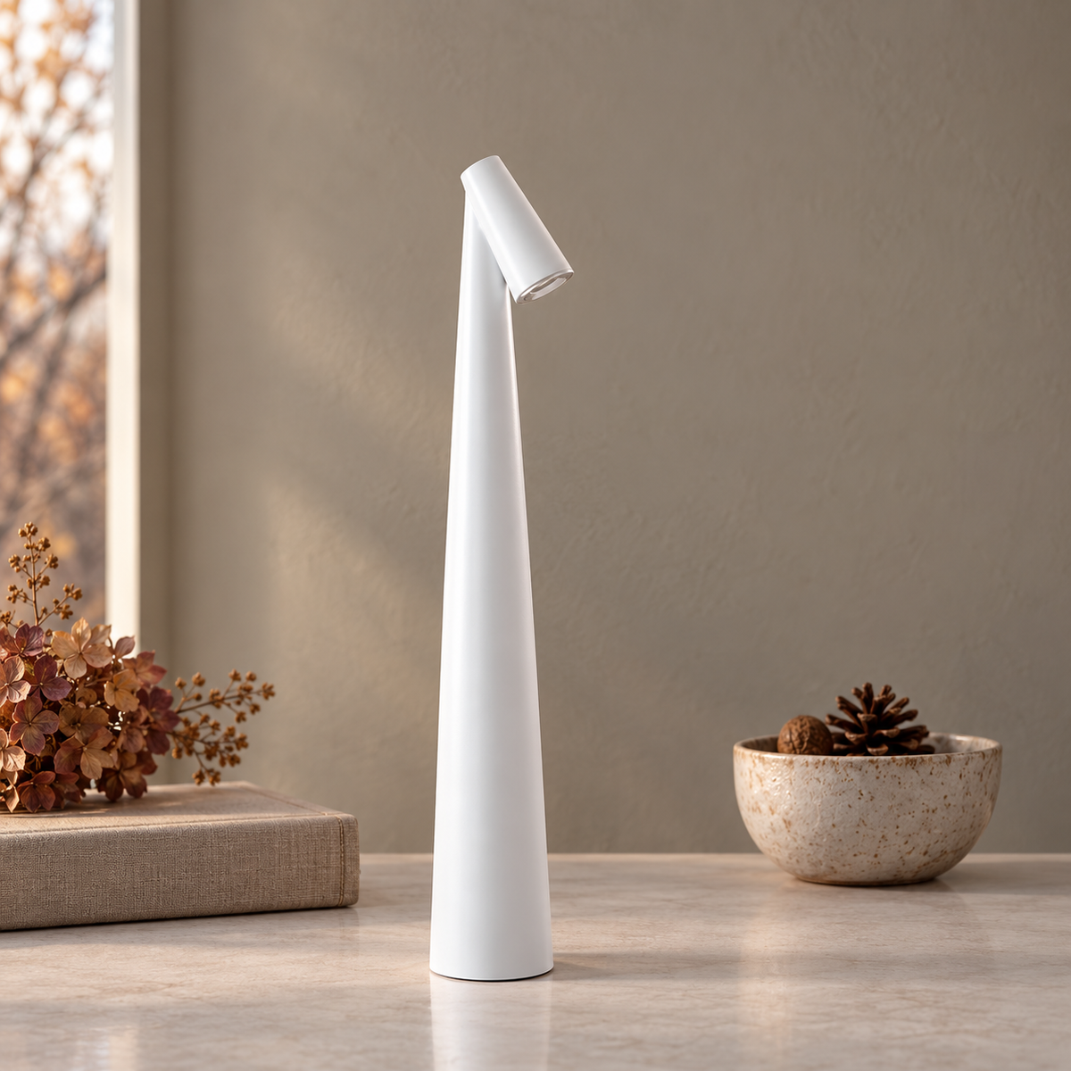 Tapered aluminium table lamp with angled spotlight head