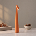 Tapered aluminium table lamp with angled spotlight head