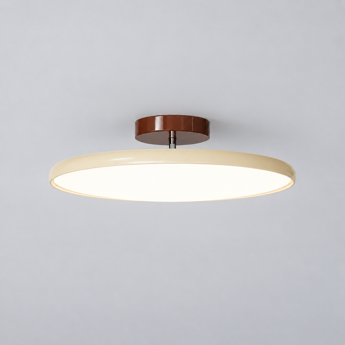 Beige ceiling light with tilting disc shade — photo 01
