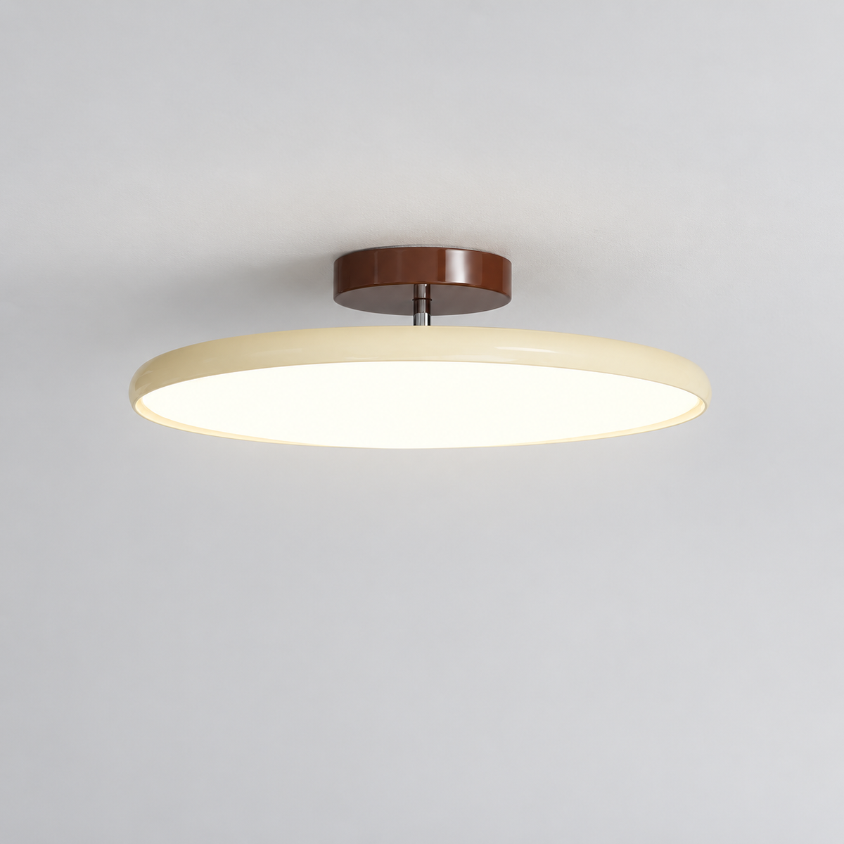 Beige ceiling light with tilting disc shade — photo 05
