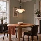 Pendant light with three layered opal glass shades and silver fitting