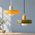 Yellow and army-green disc-shade pendant lights with beige and yellow bodies
