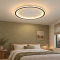 01 · Round flush ceiling light, black frame, warm-white light
