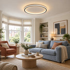 02 · Round flush ceiling light, black frame, warm-white light
