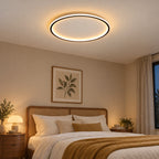 04 · Round flush ceiling light, black frame, warm-white light