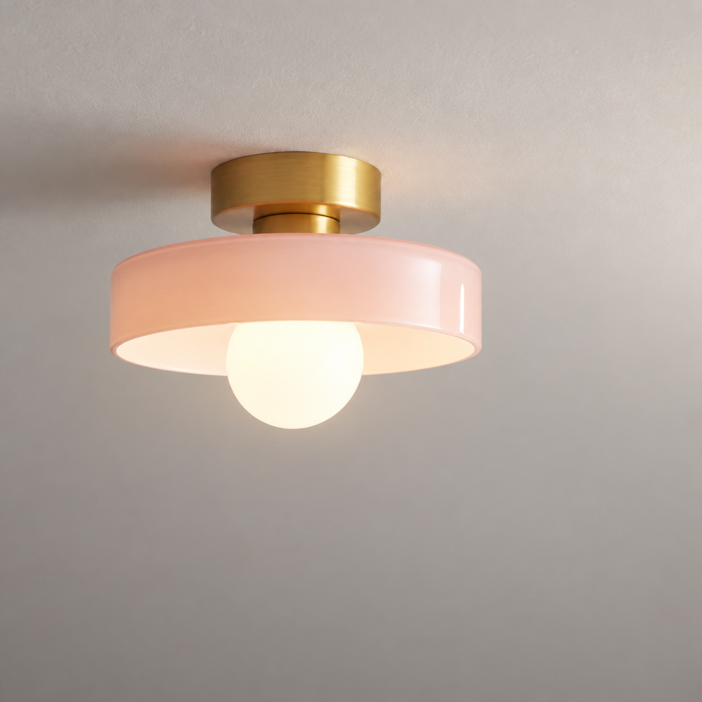 Semi flush ceiling light with gold fitting and pink glass shade