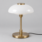 Table lamp with domed glass shade — studio product photograph