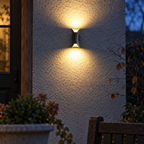 Black wall light with curved metal body