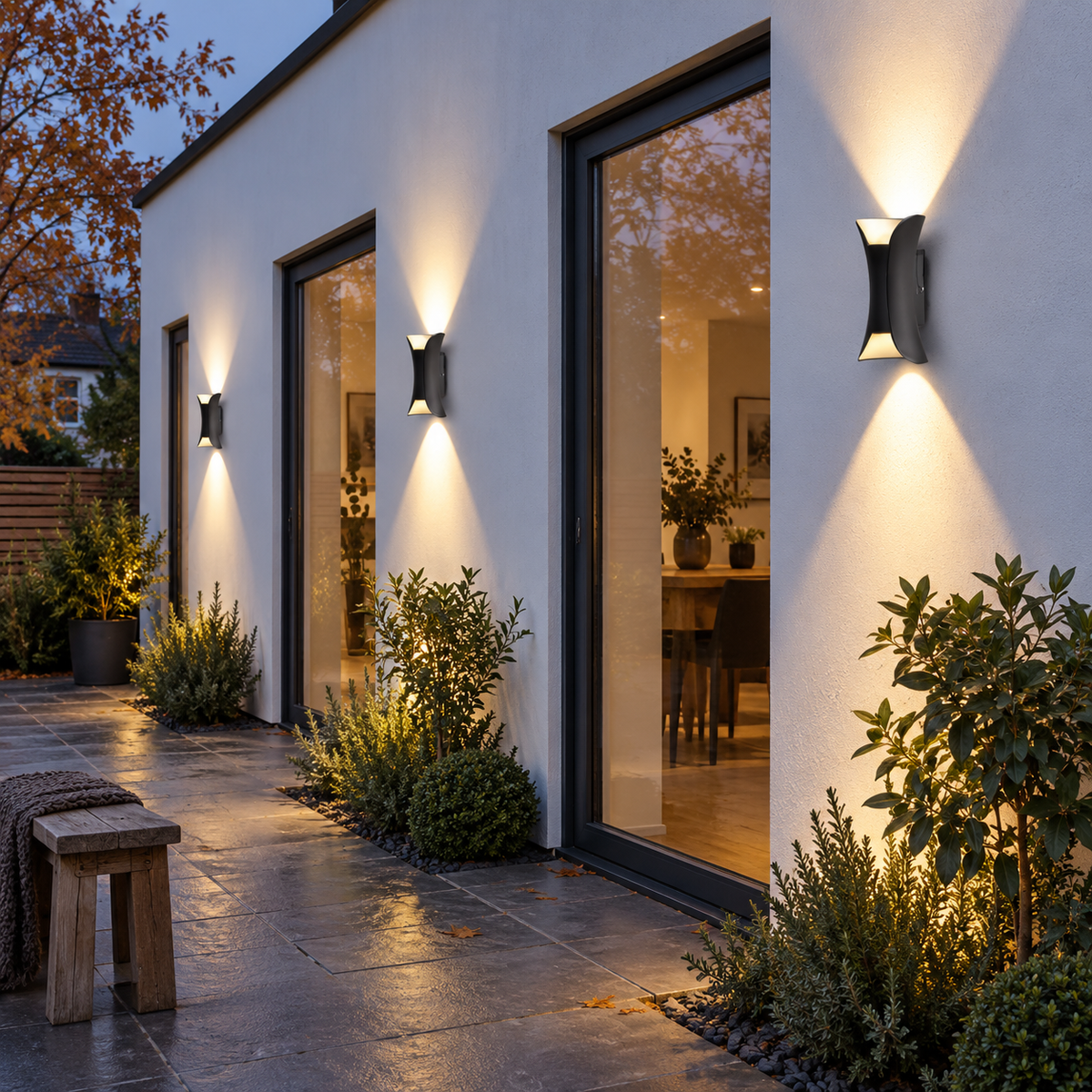 Black wall light with curved metal body