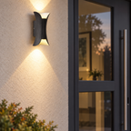 Black wall light with curved metal body