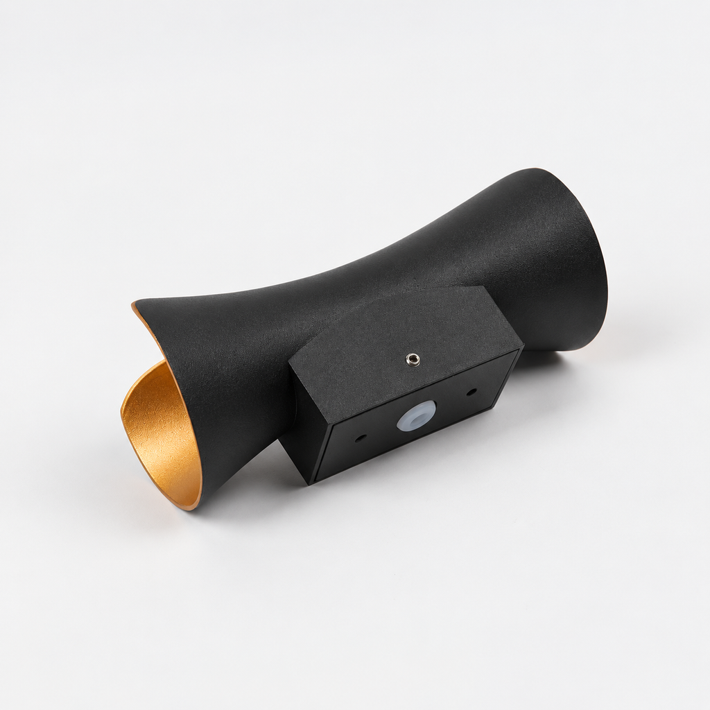 Black and Gold wall light with curved metal body