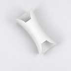 White wall light with curved metal body